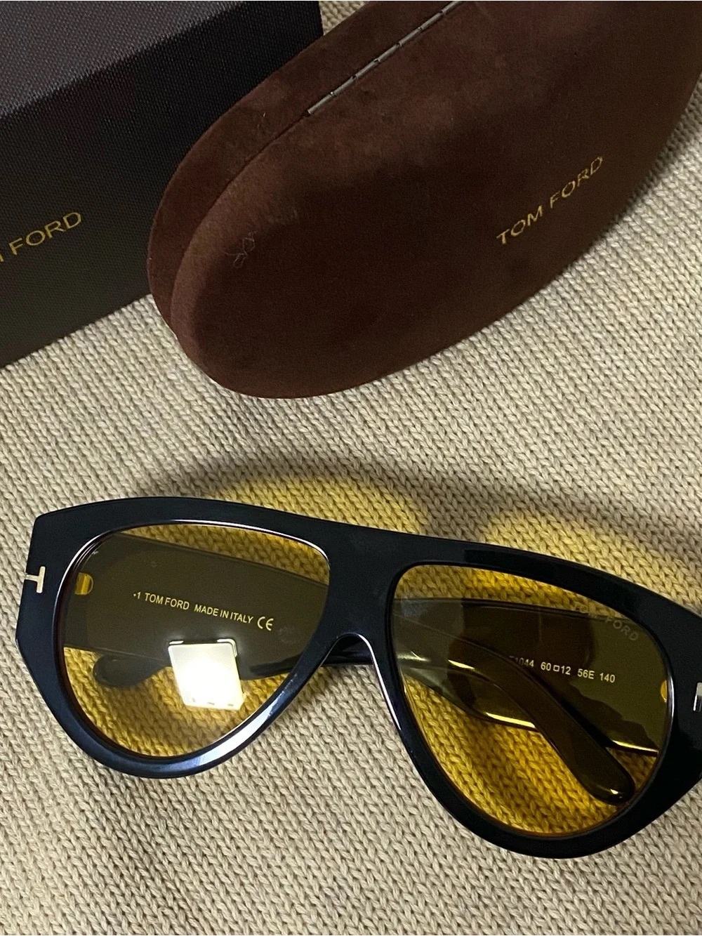 Tom Ford Black Frame Sunglasses with Yellow Lenses and Gold Accents